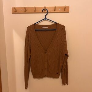 Figs cardigan size xs but fits large 
Never worn & great condition